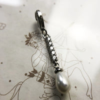 פנינת הפנימה של Dropwater Charm