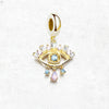 金メッキの青い目 Charm