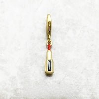 שפתון אדום מוזהב Charm