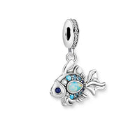 Encanto de pescado marítimo azul