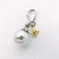 פנינת כוכב זהב Charm