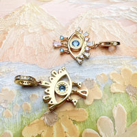 עין כחולה מצופה זהב Charm