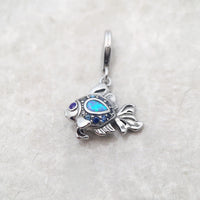 Encanto de pescado marítimo azul