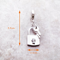 נעילה עם מפתח Charm תִליוֹן