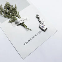הישאר יד אמיתית Charm