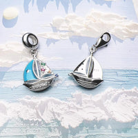 Encanto de bote de vela azul
