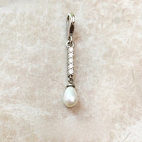 פנינת הפנימה של Dropwater Charm