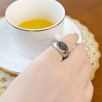 Anillo de encantos de karma