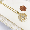 黄金の太陽のネックレス